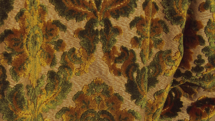 Close up photo of the brocade velvet fabric from the House of Glass Carpetbag Bomber Jacket