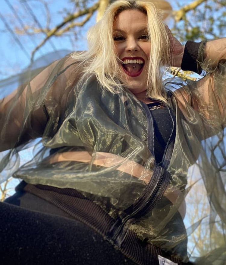 close up picture of female plus size model wearing Olive Myself Organza bomber jacket