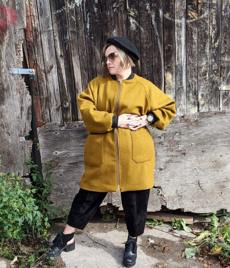 picture of female model wearing mustard simple winter coat
