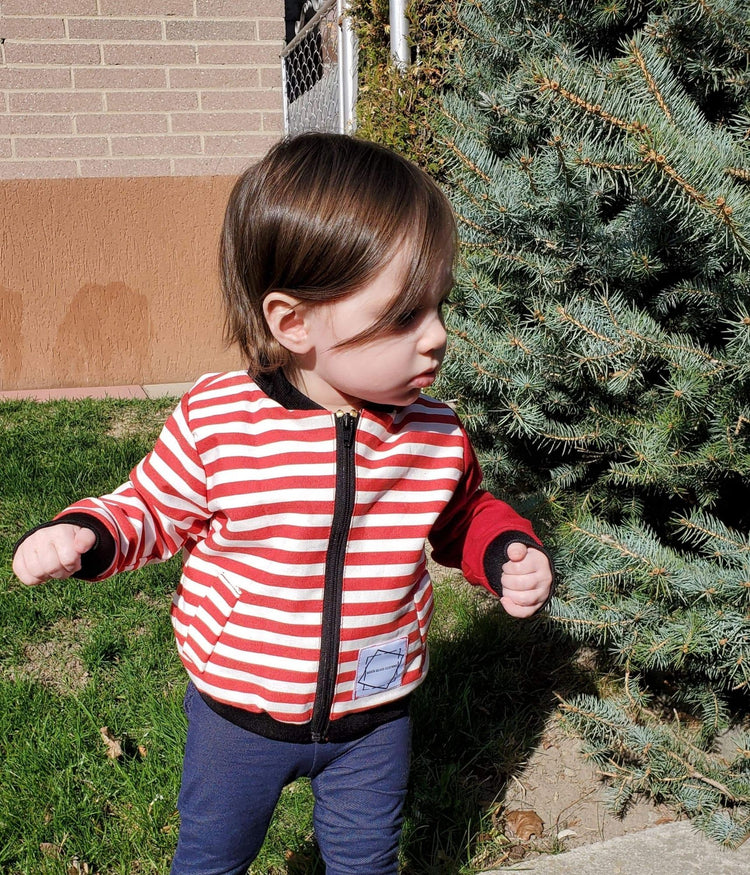 picture of infant female model wearing Baby Jesus Bomber Jacket