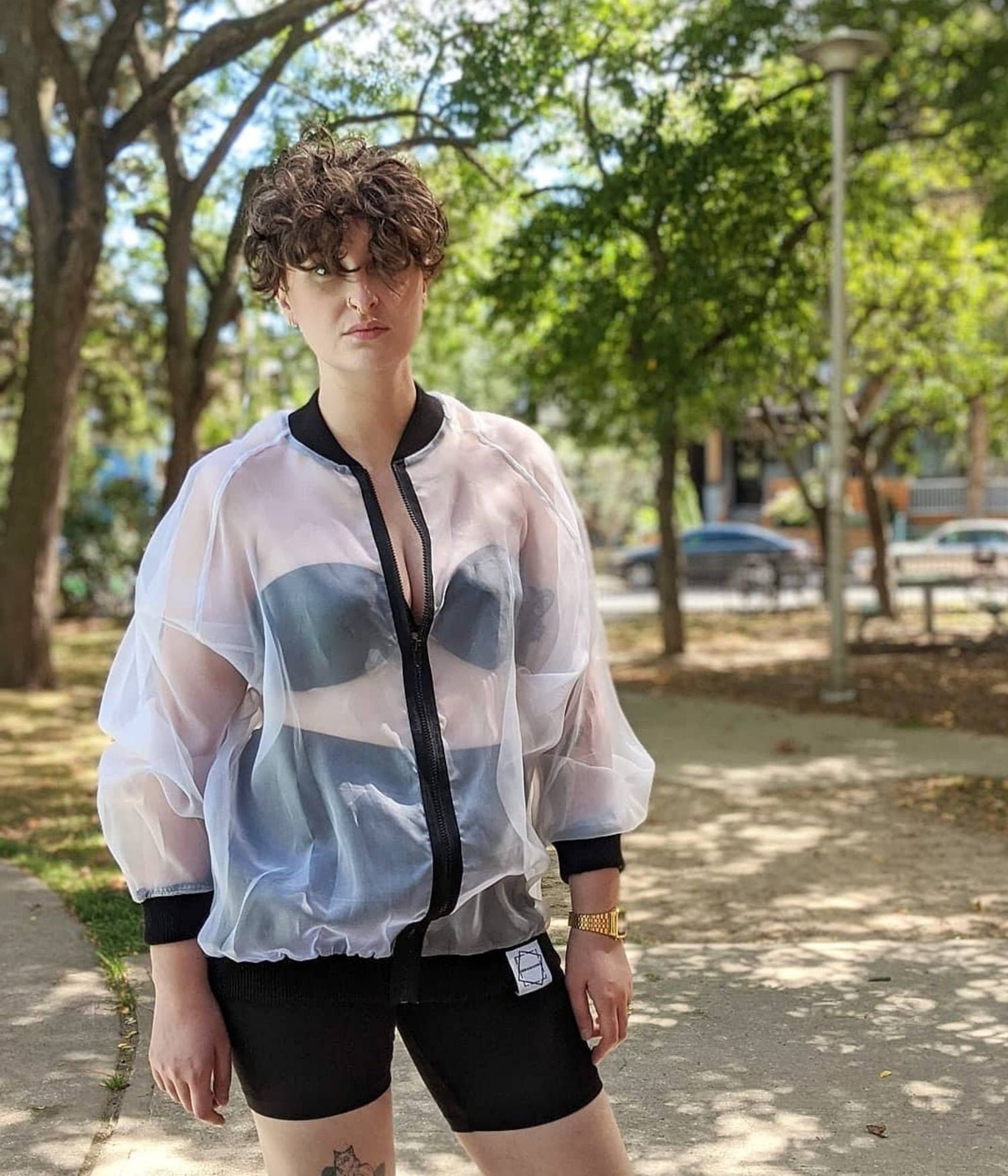 picture of non binary model wearing Sick White Organza Bomber Jacket